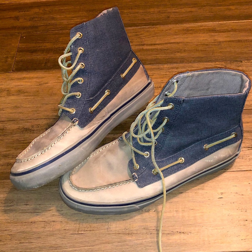 Men’s high top Sperry shoes.